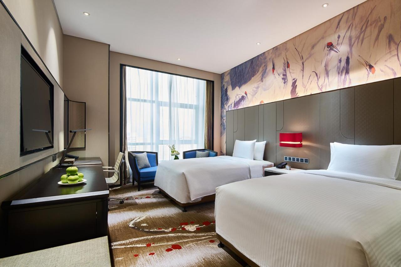 Wanda Realm Qiqihar Hotel Exterior foto